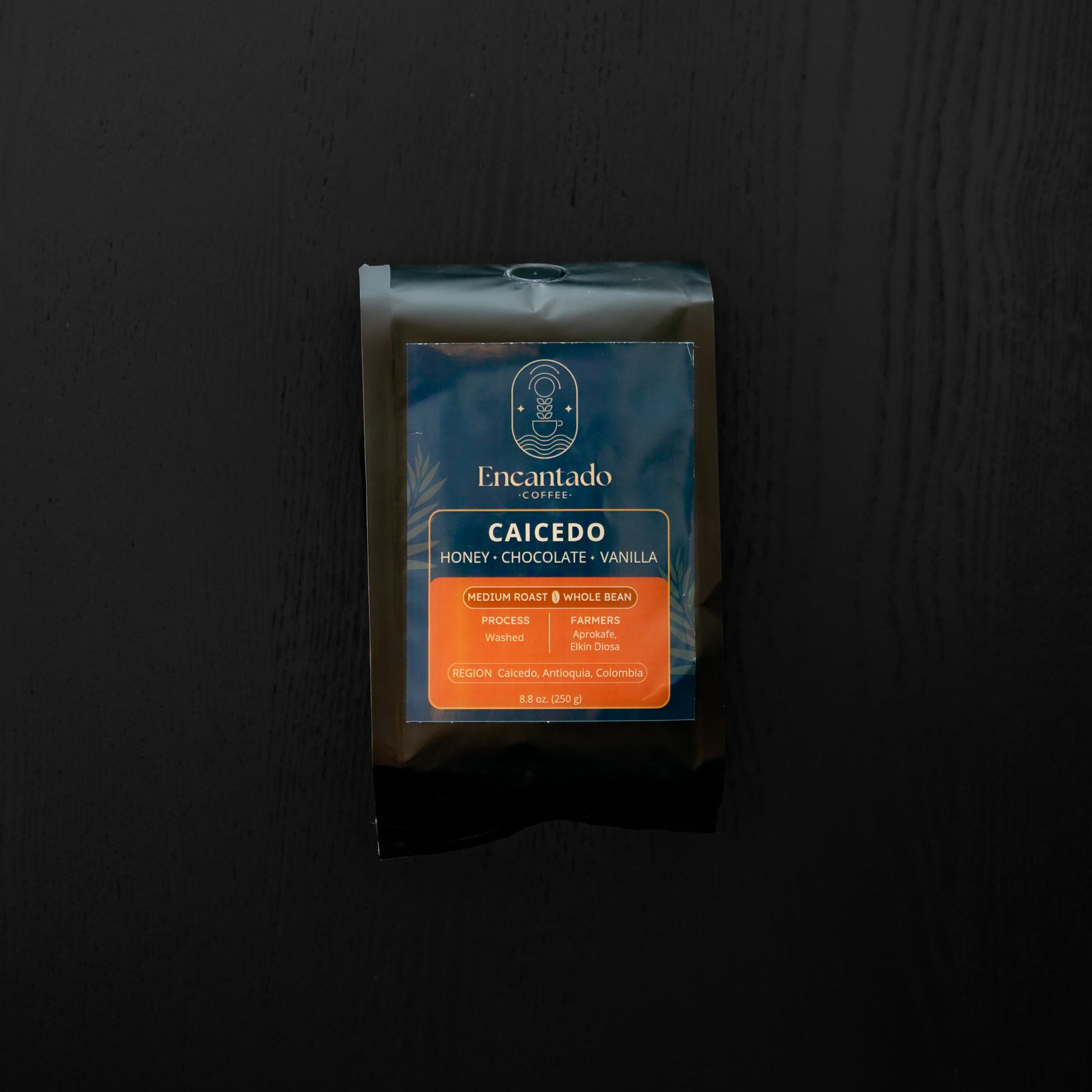 Coffee package with 'Caicedo' branding on a black background