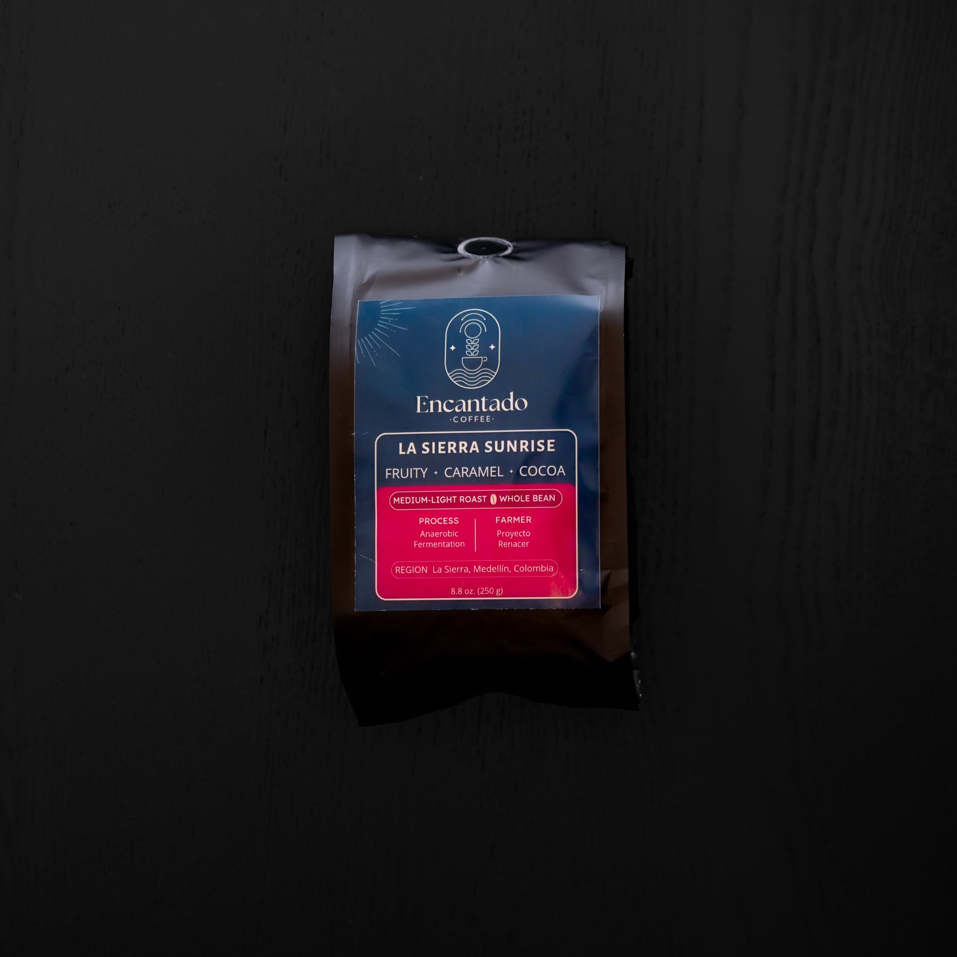Coffee package labeled 'La Sierra Sunrise' on a dark background
